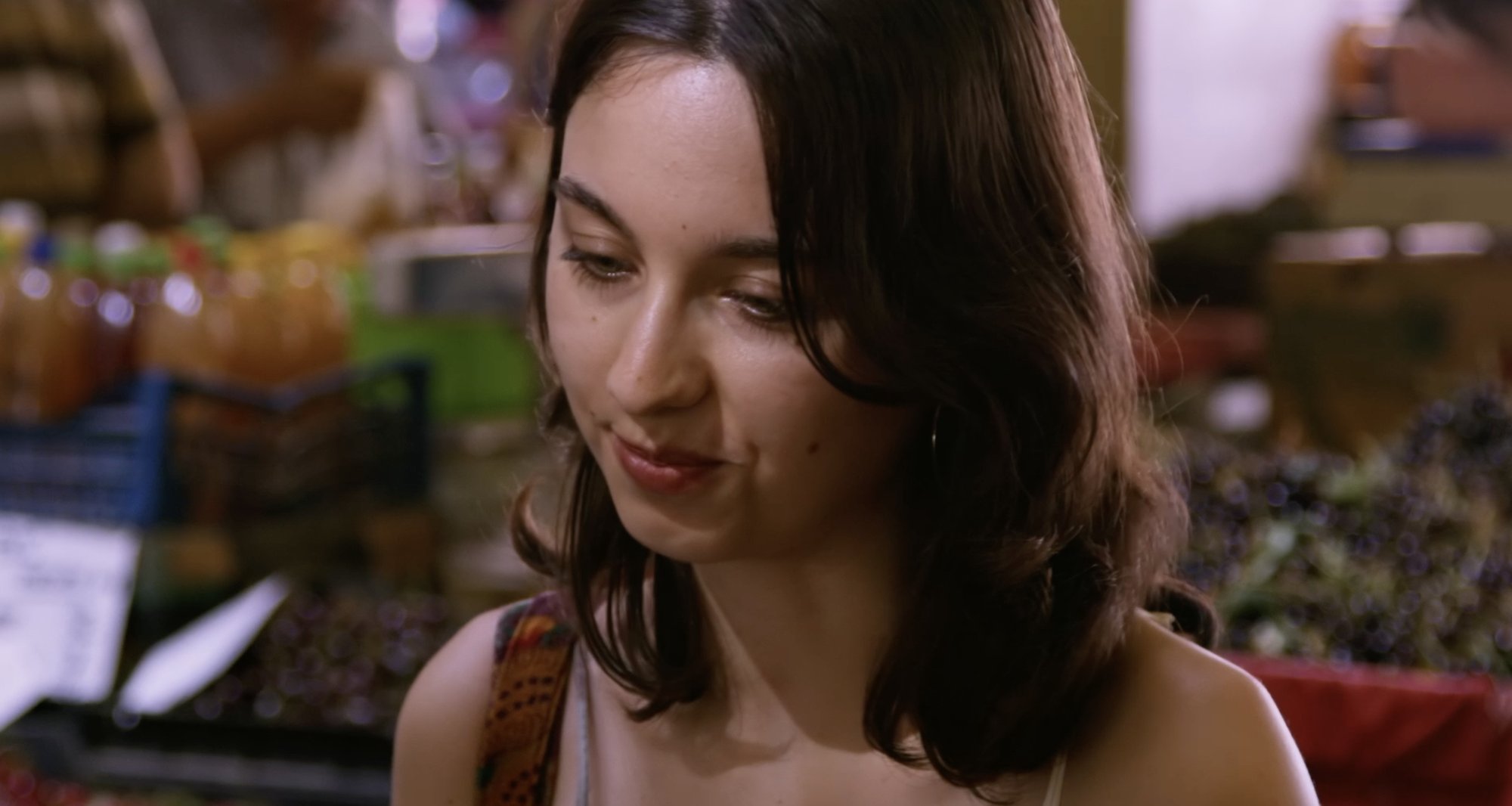 Food Markets — a young woman at a market stall
